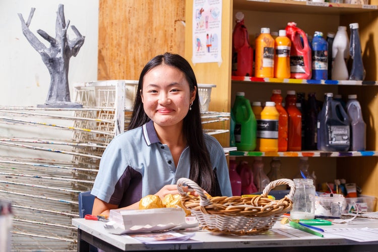 A student in an art classroom