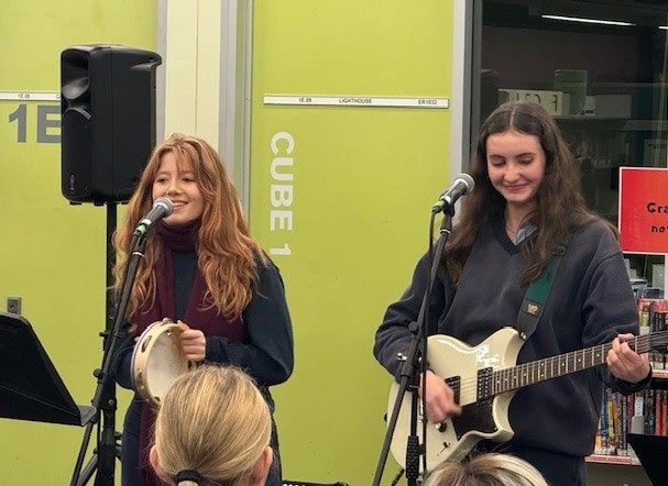 Two students sing at the CPA Soiree